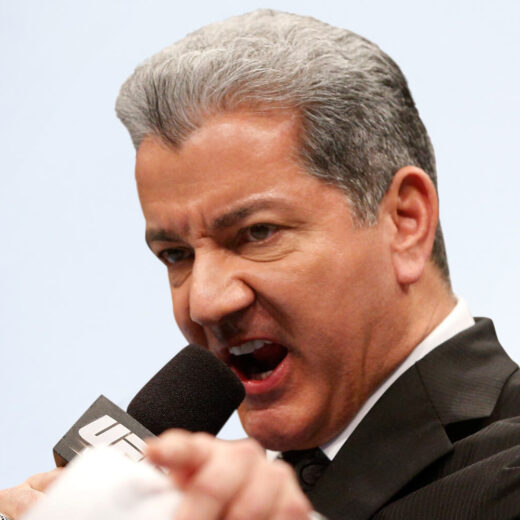 NEWARK, NJ - FEBRUARY 01:  Bruce Buffer introduces Ali Bagautinov before his flyweight fight against John Lineker at the UFC 169 event inside the Prudential Center on February 1, 2014 in Newark, New Jersey. (Photo by Josh Hedges/Zuffa LLC/Zuffa LLC via Getty Images)