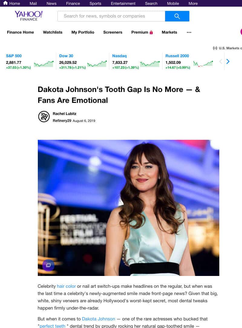 screenshot of a article titled: Dakota Johnson's Tooth Gap Is No More — & Fans Are Emotional